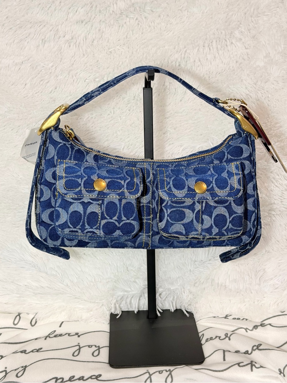 Coach Cargo Shoulder Bag
In Signature Denim with brass hardware NWT